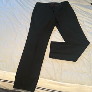 Mid rise straight sloan pants.